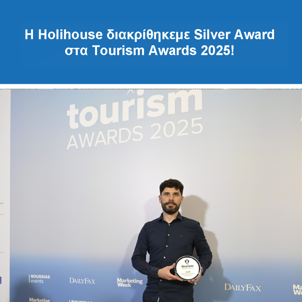 man holding award